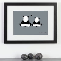 Personalized framed print of 2 pandas in love with a significant date above some ornamental eggs.
