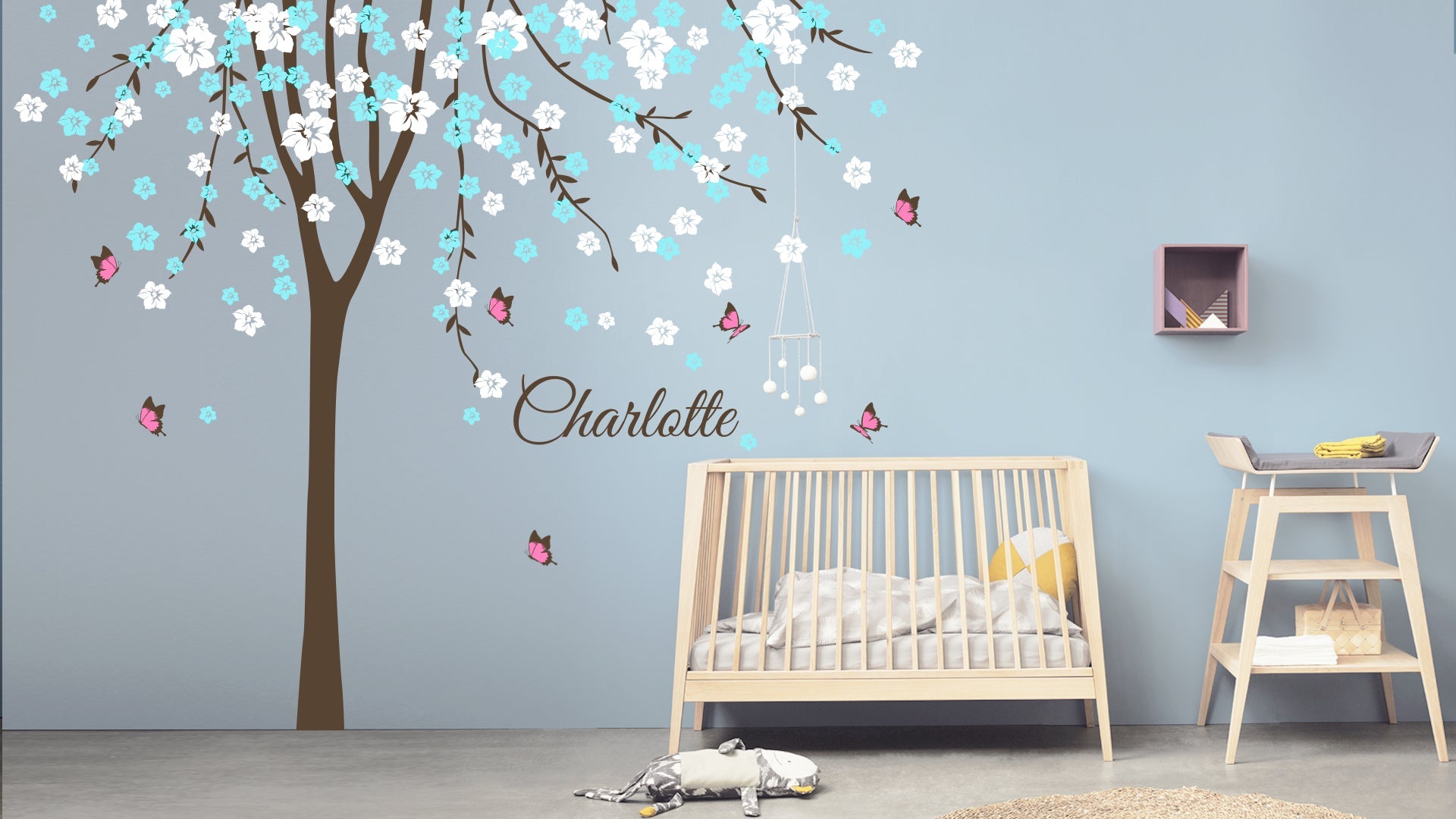 Tree Wall Sticker with butterflies in nursery with baby's crib