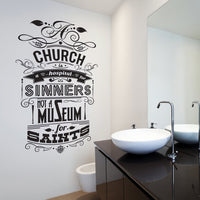 Wall quote sticker with text "A Church Is A Hospital For Sinners, Not A Museum For Saints" in a bathroom.