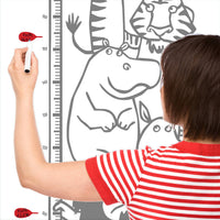 Height chart wall sticker with a pile of animals with a mother charting the height of their child.