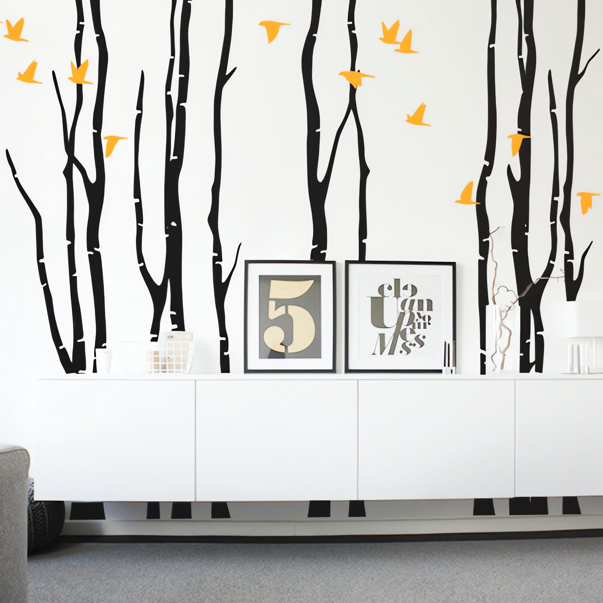 Tree wall sticker with birds in a living area with a countertop.