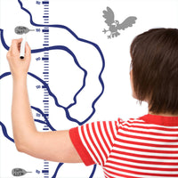 Height chart wall sticker of a monkey with a jetpack with a mother charting the height of their child.
