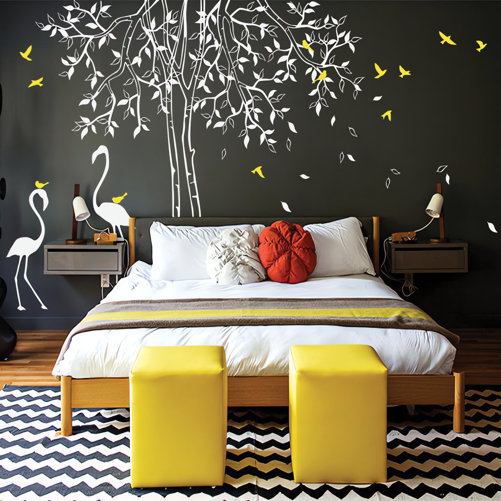 Tree wall sticker with flamingos in a bedroom.
