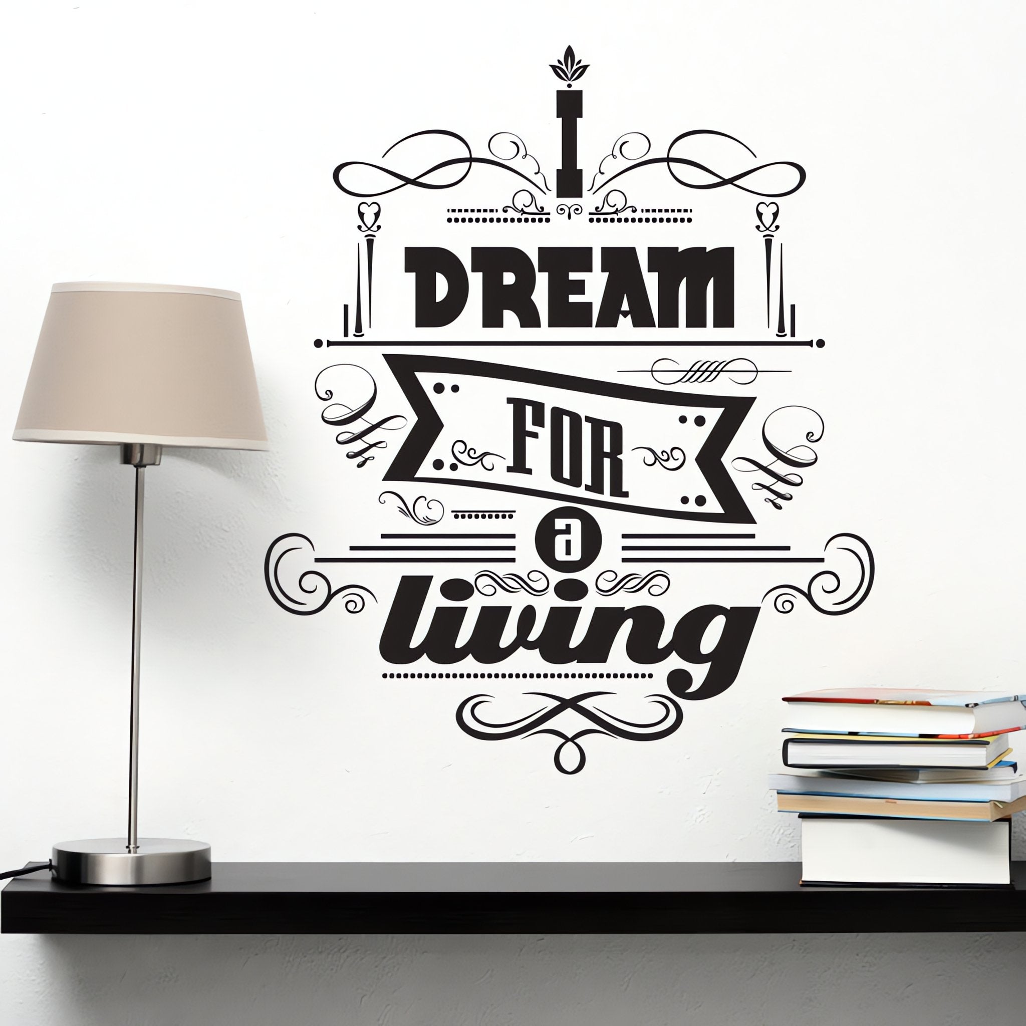 Wall quote sticker with text "I Dream For A Living" next to a shelf, a lamp and some books.