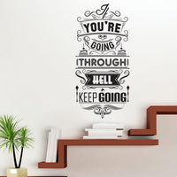 Wall quote sticker with text "You Only Live Once But If You Do It Right Once Is Enough" above a modern shelf.