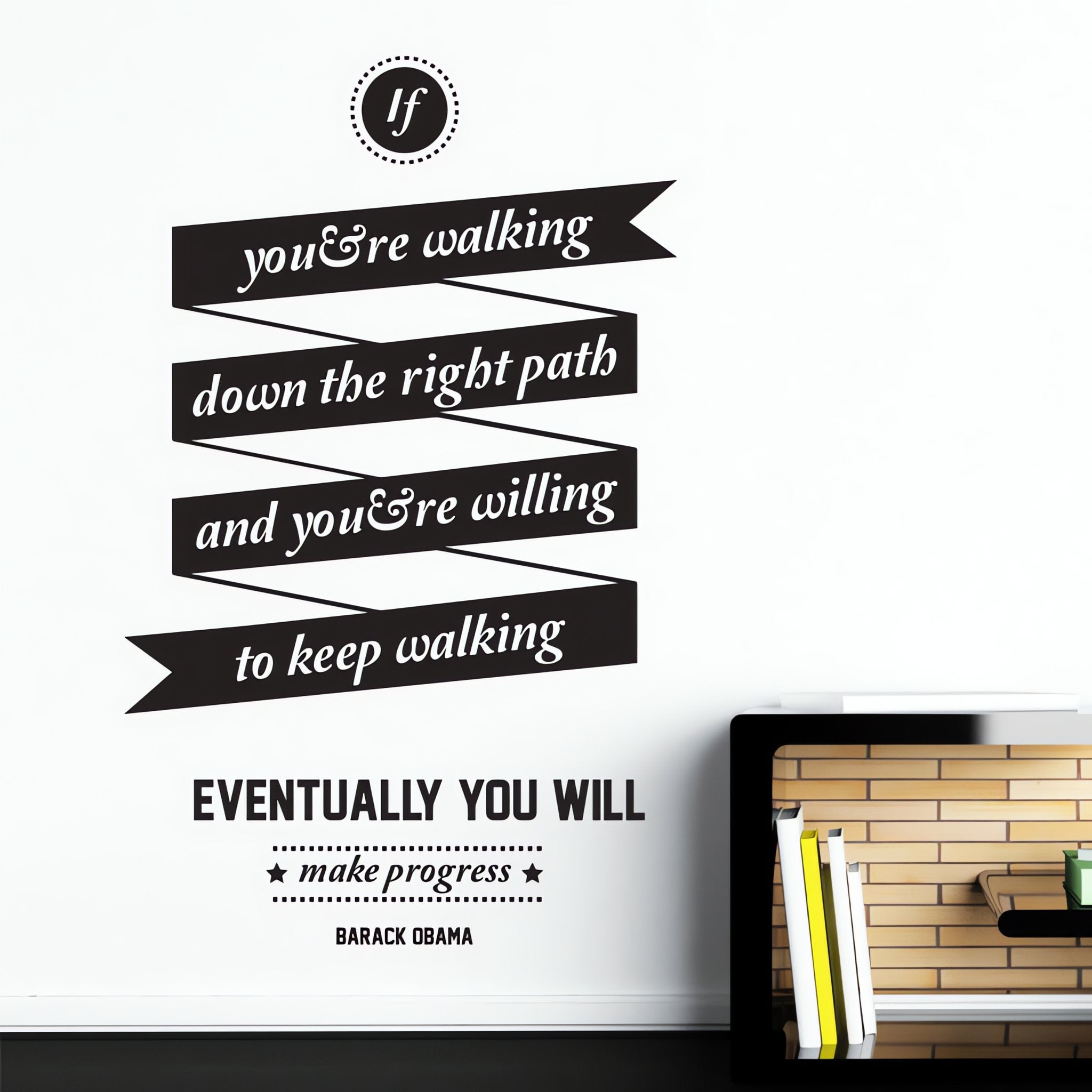 Wall quote sticker with text "If You're Walking Down The Right Path And You're Willing To Keep Walking Eventually You Will Make Progress" next to a modern bookcase.