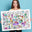 A colour in party poster with monsters and aliens partially filled in and being held by a young woman.