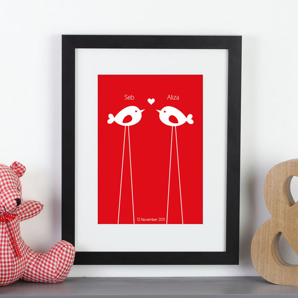 Personalized framed print with 2 birds with names and a date next to a teddy bear.