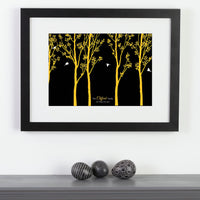 Personalized framed print with trees and family of birds with names next to ornamental eggs.