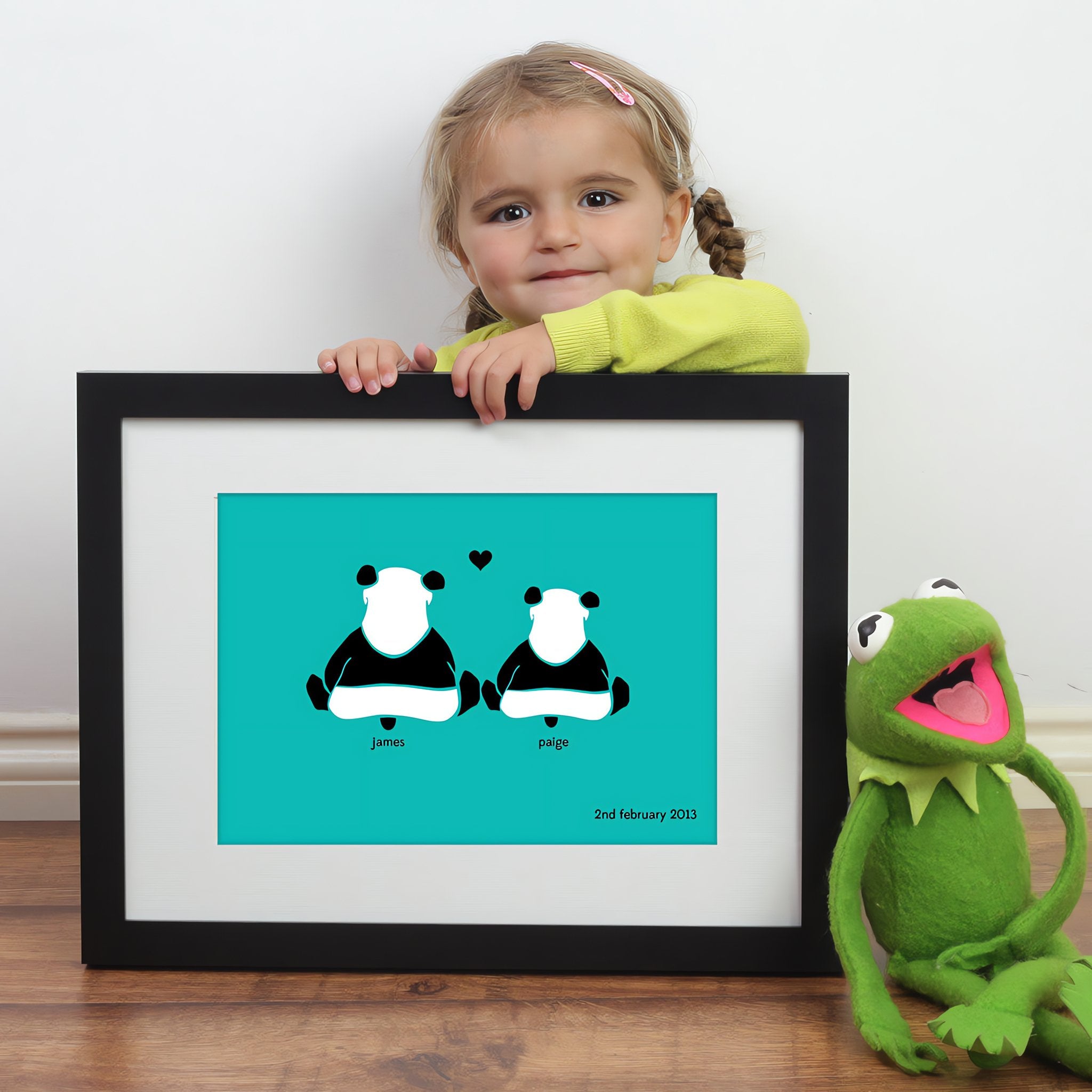 Personalized framed print of 2 pandas in love with a significant date next to kermit the frog and a young girl.