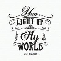 Wall quote sticker with text "You Light Up My World" by One Direction.